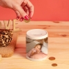 Regalos de Fotoprix, hucha personalizada con foto. Revive tu foto más especial cada vez que guardes monedas en tu hogar. Ideal para hacer un regalo original.